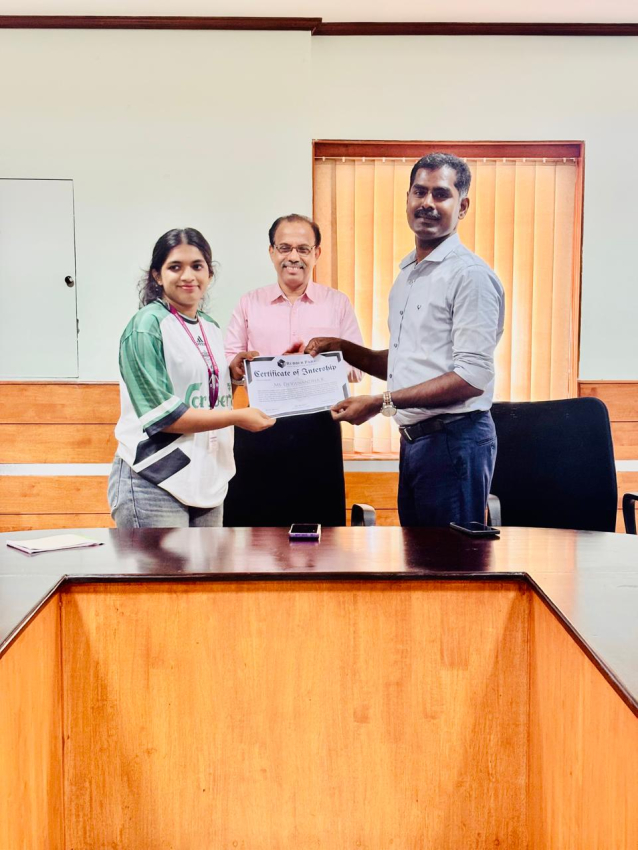 Internship Certificate handed over by Dr Dileep Asst Director JJMRC to student from St Josephs College, Calicut